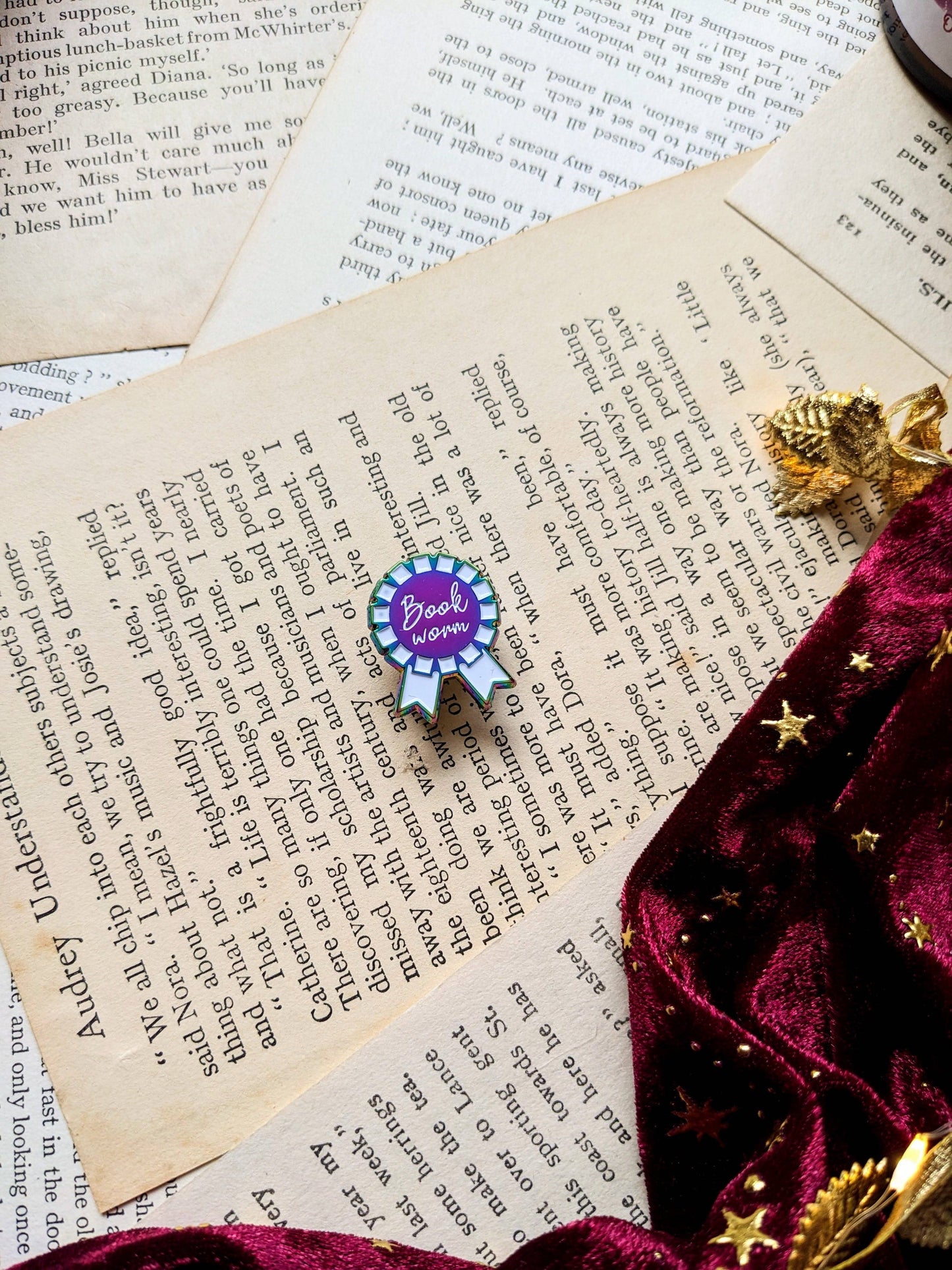 Book worm rosette hard Enamel pin (rainbow and white edition)
